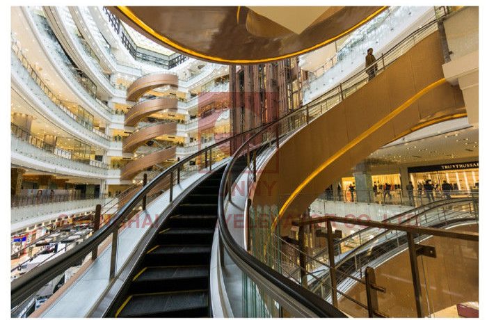 Curved escalator in mall